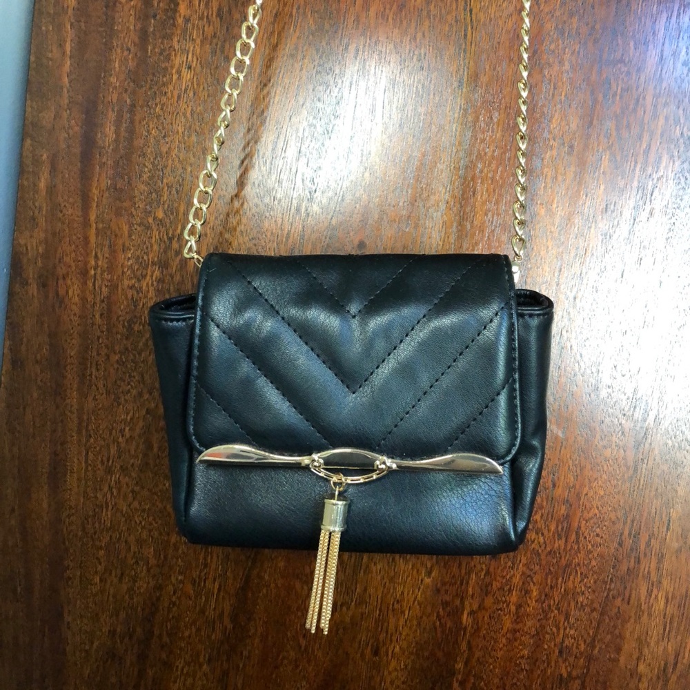 Leather look black and gold bag
